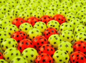 red & green colored balls of paint